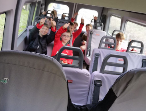 Marden pupils are pictured sitting on a minibus ready to go and play Football against St. George's School.